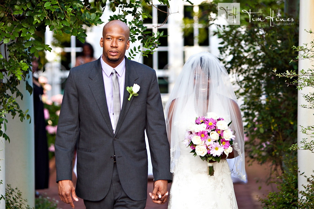 Bride walks at Daniel Stowe DSBG Charlotte Wedding Photographer